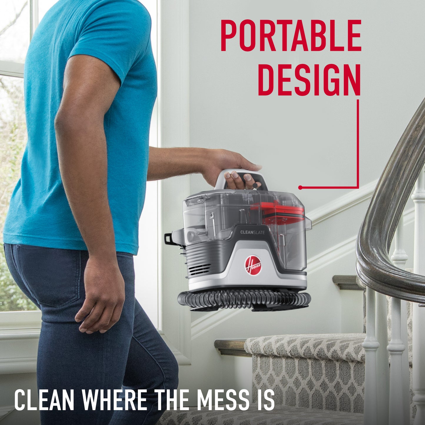 Woman easily carrying her Cleanslate pet and carpet upholstery spot cleaner upstairs displaying it's lightweight portable design