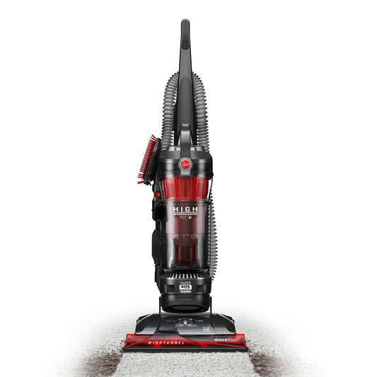 Front view of the Hoover windtunnel high performance pet vacuum cleaner, featuring a red and black design with a clear dustbin.  